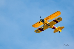 D8504139-Bi-Plane-Flying-Overhead
